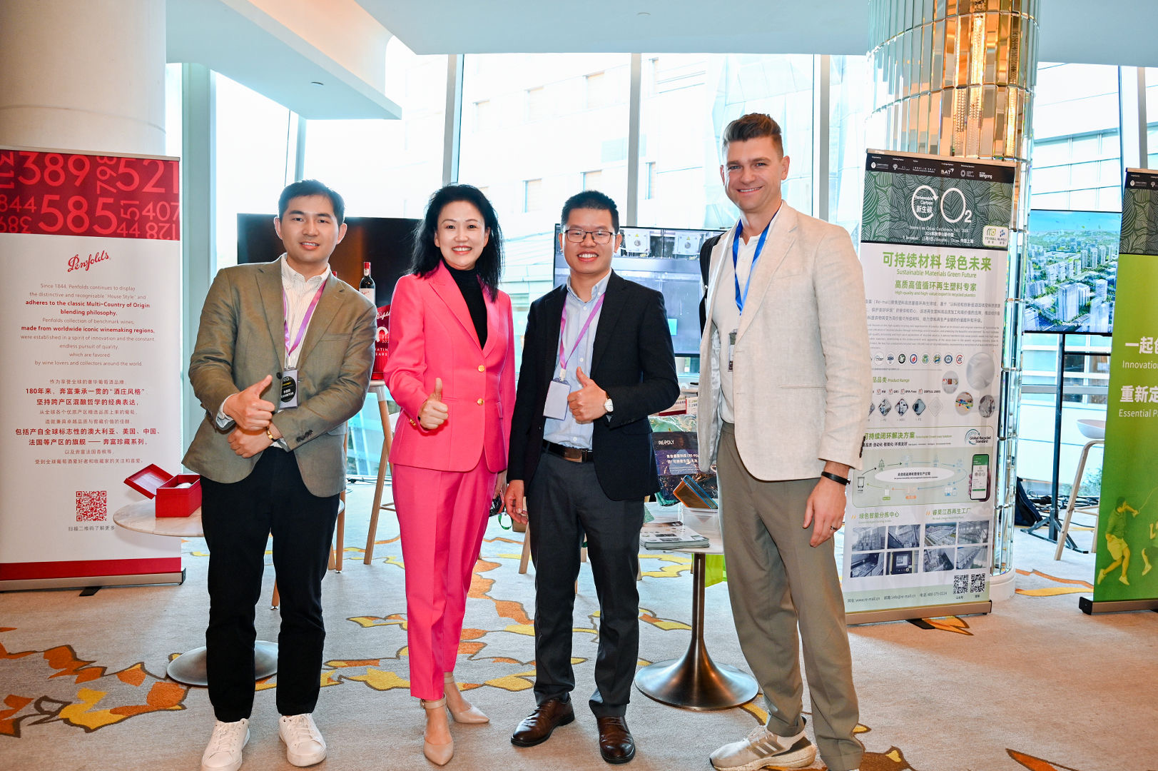 Dr Min Zhou with exhibitors