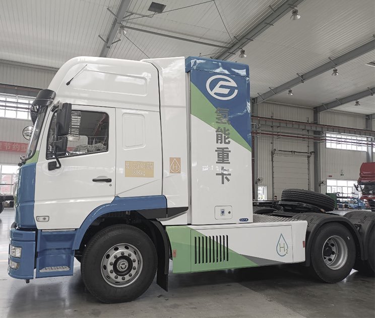 A Guofu hydrogen heavy truck in a factory hall